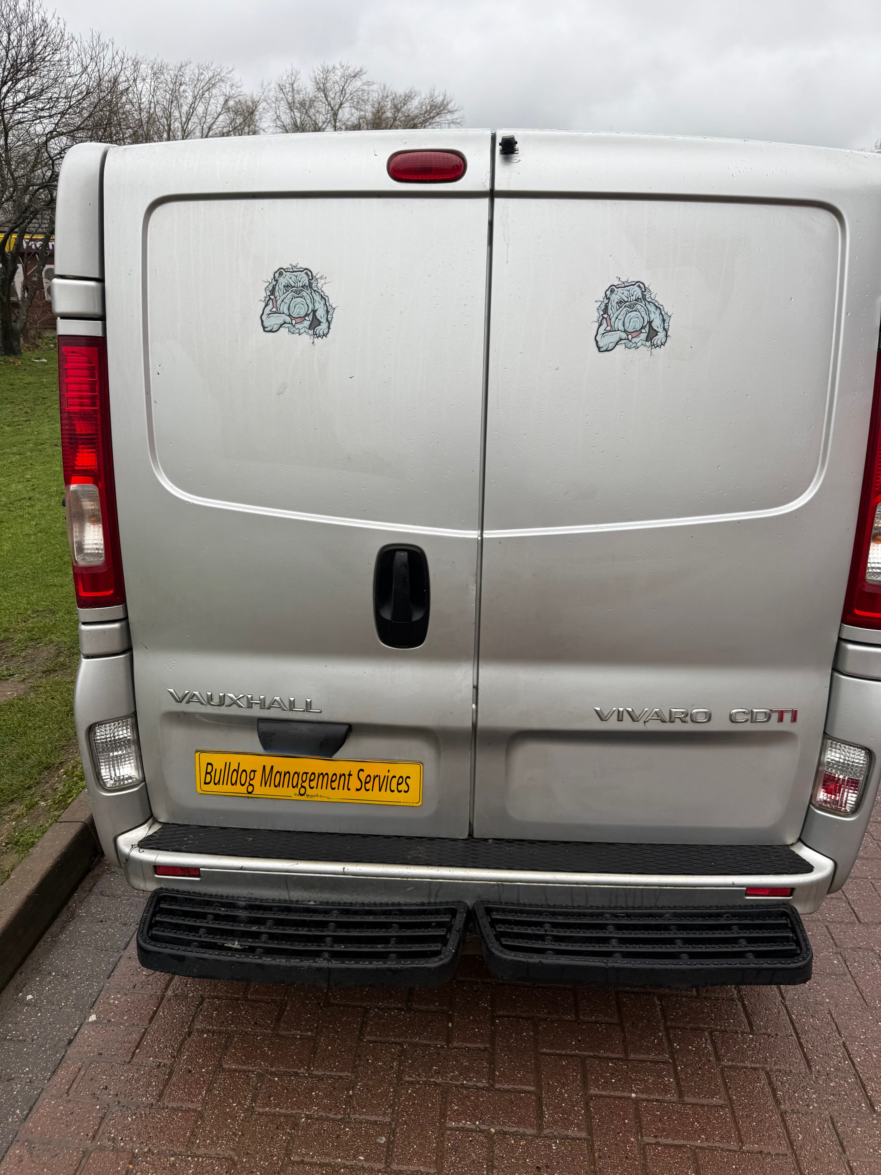 Bulldog Management Services courier van - rear view showing branding